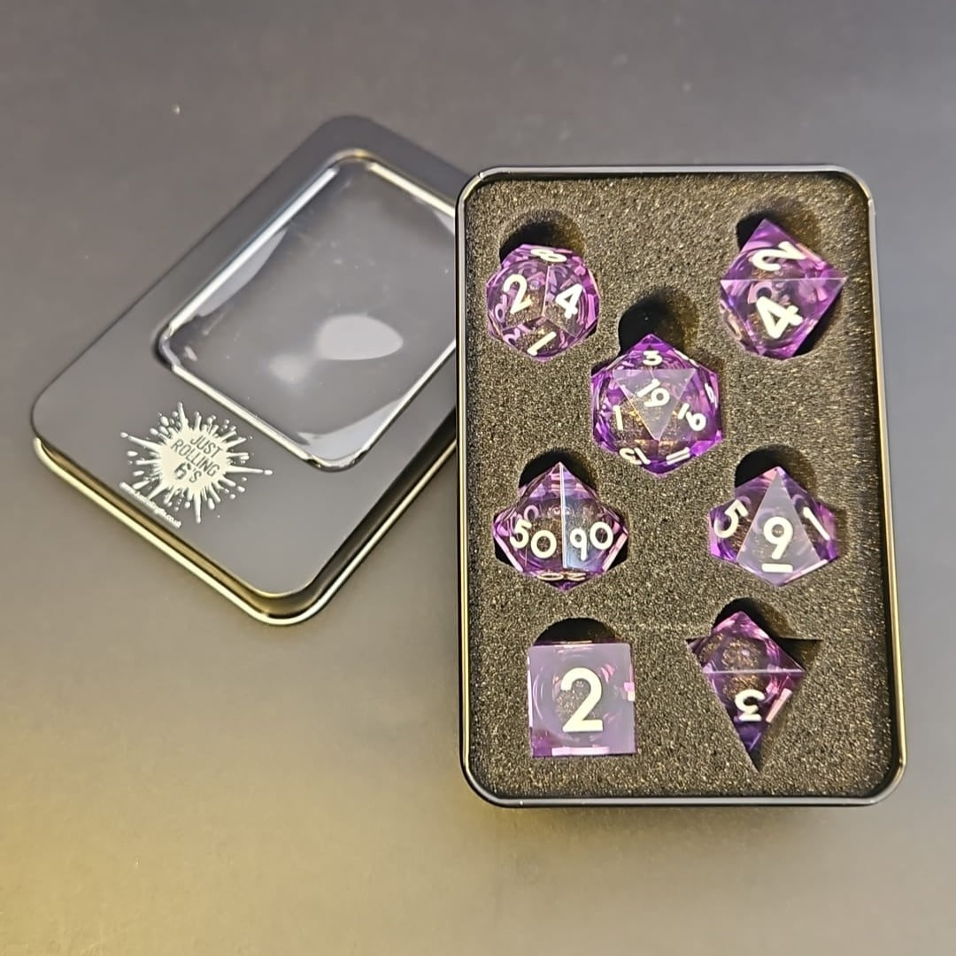 Purple Black and Gold Glitter 7 Piece Liquid Core Dice Set with white Numbering, in Metal Box