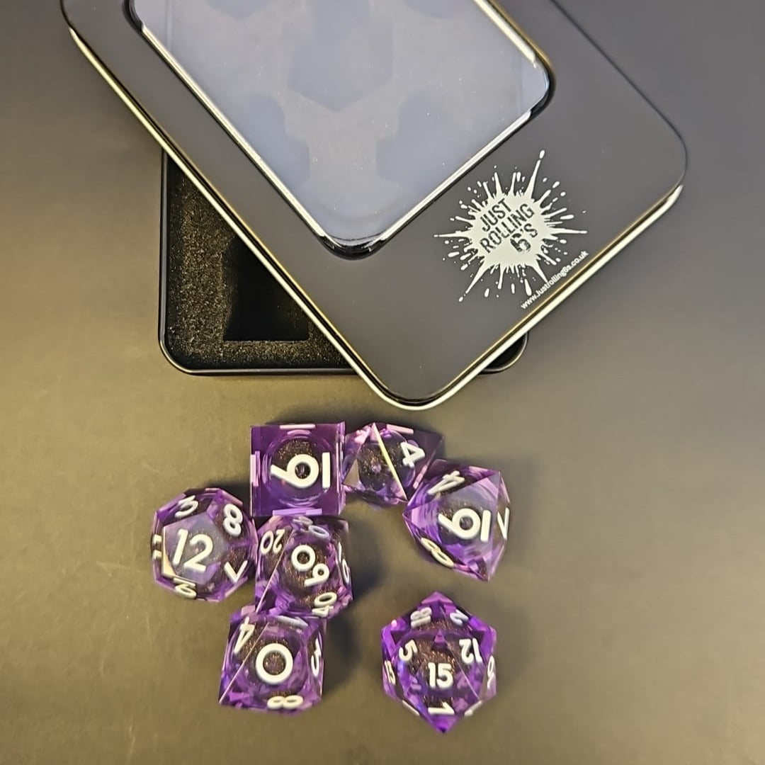 Purple Black and Gold Glitter 7 Piece Liquid Core Dice Set with white Numbering, in Metal Box