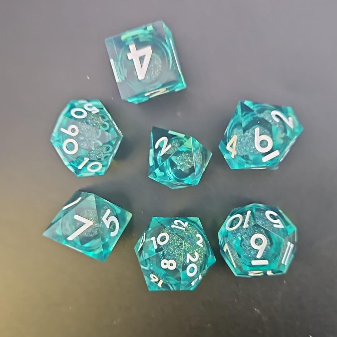 Light Blue Liquid Core Dice Set with White Numbering in Metal Box
