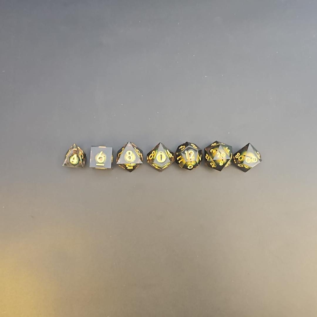 Yellow Dragon Eye Liquid Core Dice Set With Gold Numbering in Tin