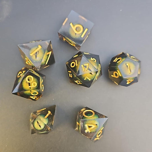 Yellow Dragon Eye Liquid Core Dice Set With Gold Numbering in Tin