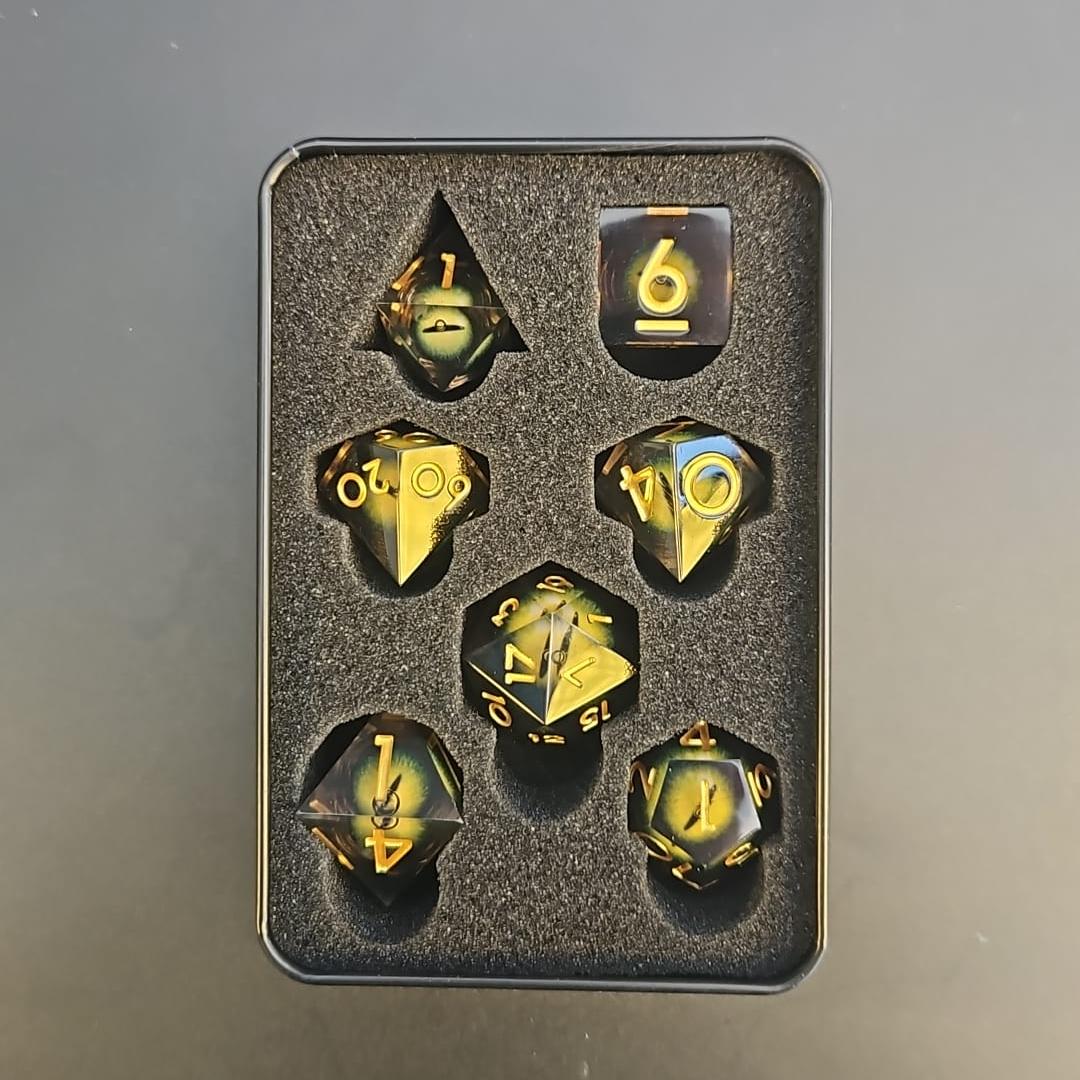 Yellow Dragon Eye Liquid Core Dice Set With Gold Numbering in Tin