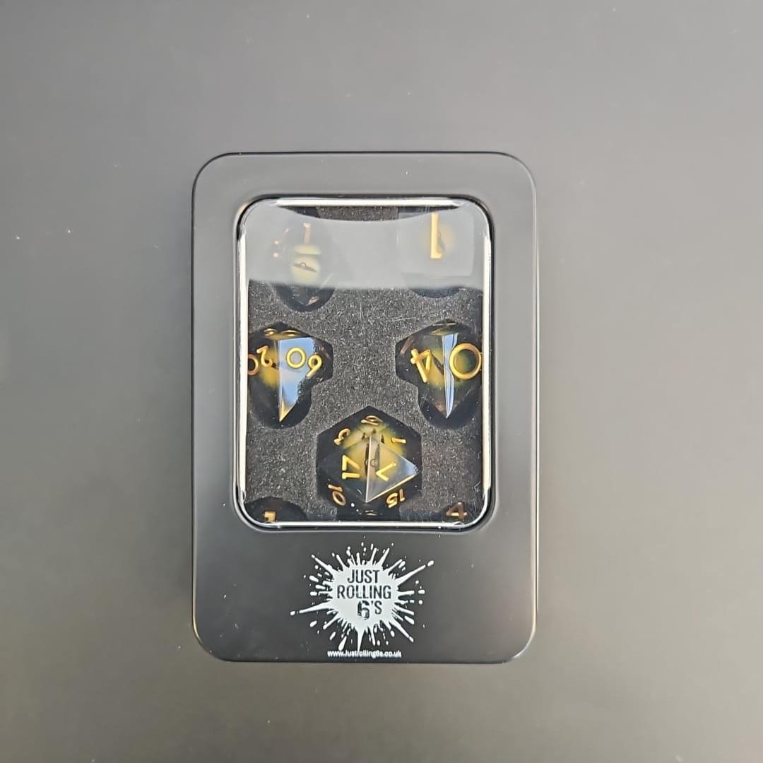 Yellow Dragon Eye Liquid Core Dice Set With Gold Numbering in Tin