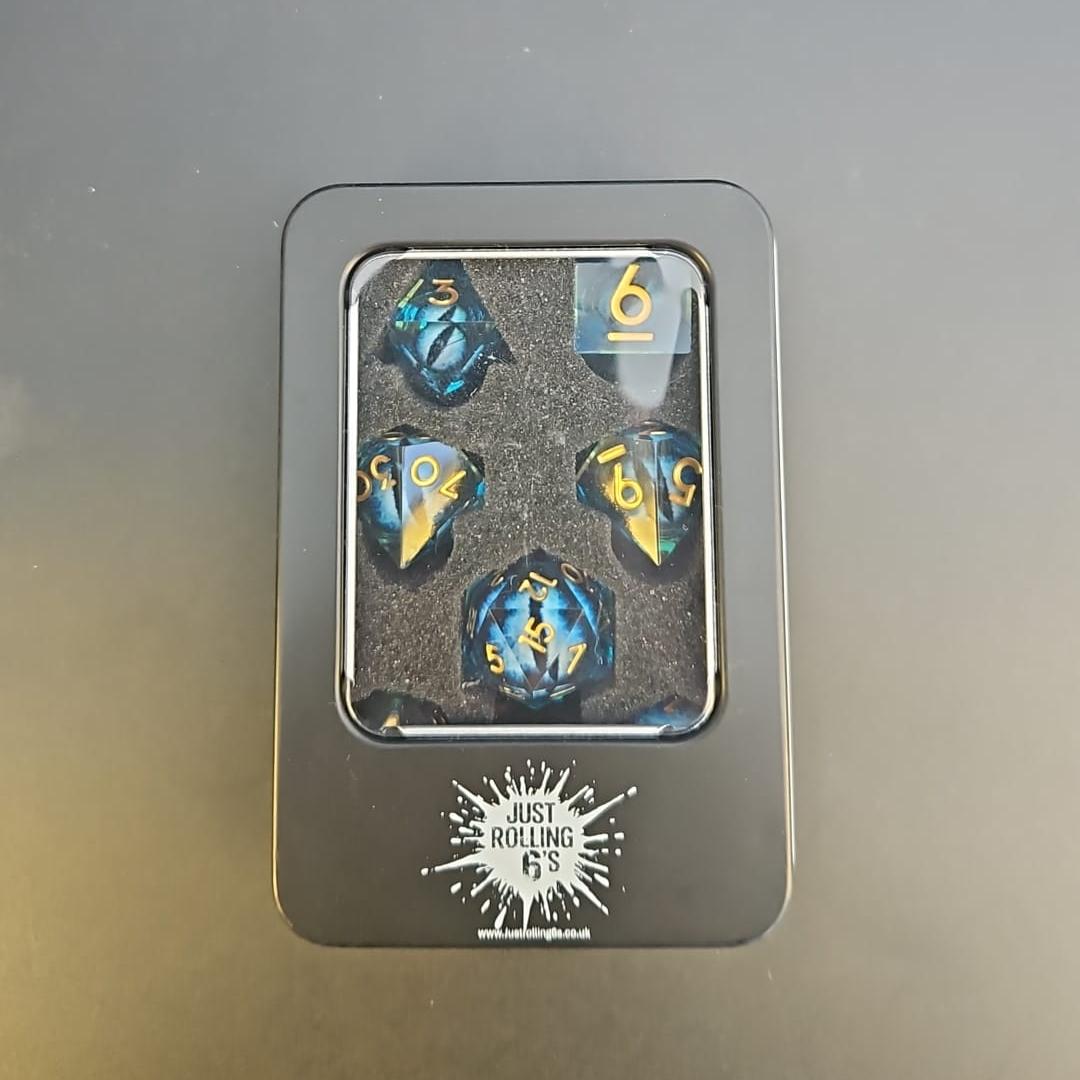 Blue Dragon Eye Liquid Core 7 Piece Dice Set with Gold Numbering in Tin