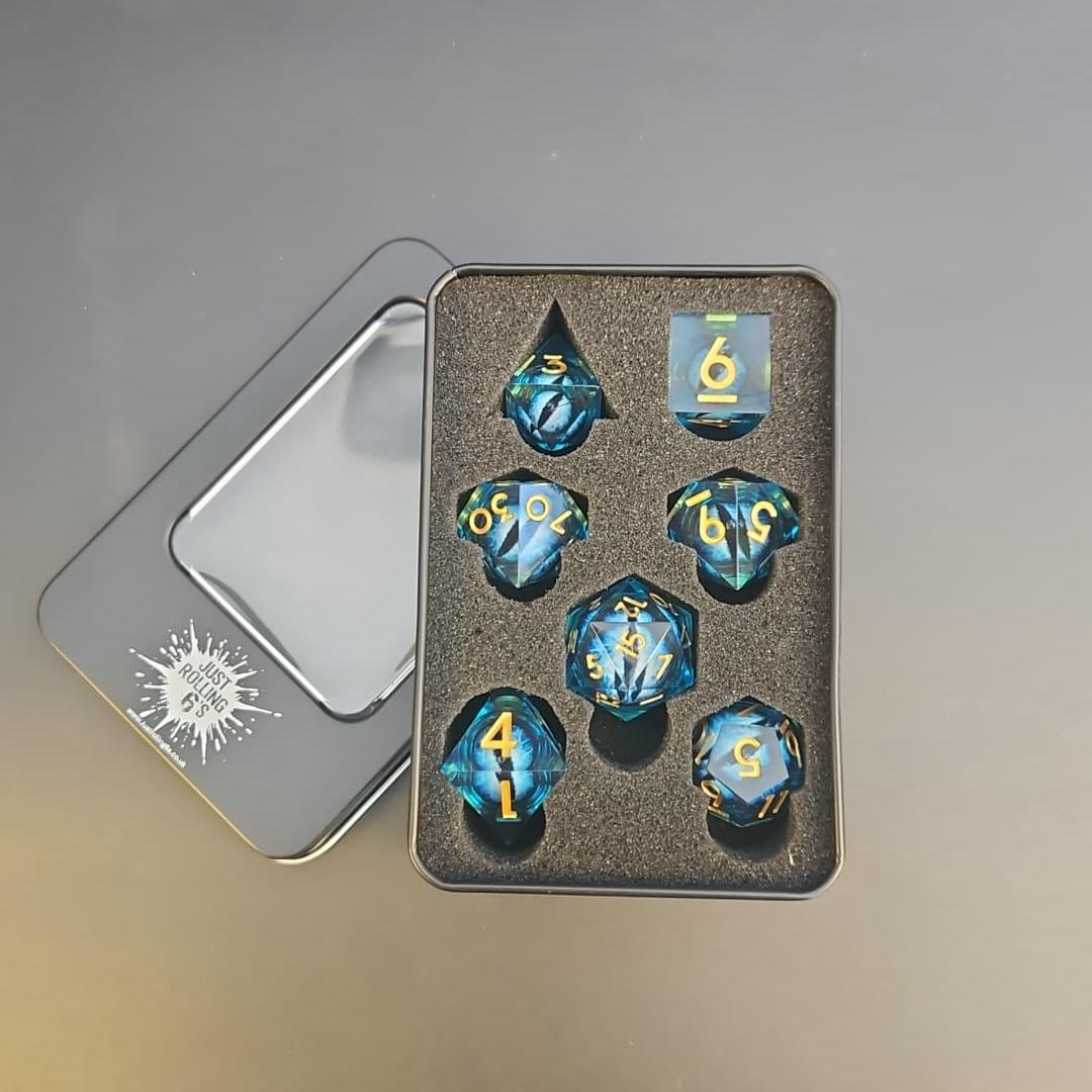 Blue Dragon Eye Liquid Core 7 Piece Dice Set with Gold Numbering in Tin