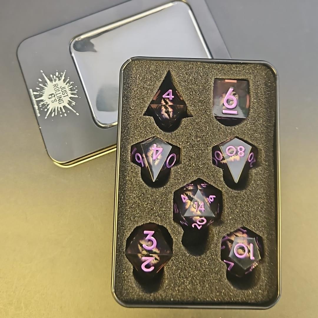 Black Dragon Eye Liquid Core 7 Piece Dice Set with Purple Numbering in Tin