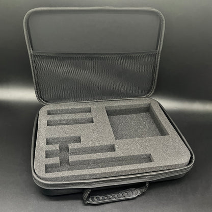 Gray hard-shell carrying case with foam interior on a gray background